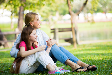 Fototapeta premium Happy family concept, Happy Mother and son be smile and sitting in the park