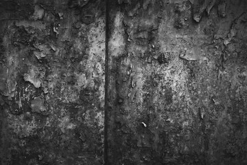 Texture of an old worn out scratched the surface. Black and white grunge background, peeling paint. Empty space, free space