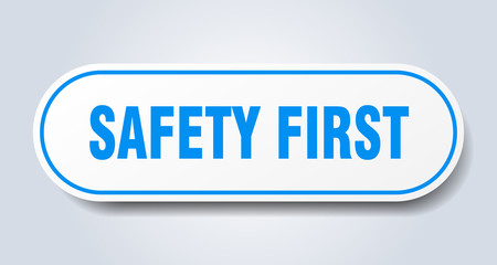 safety first sign. safety first rounded blue sticker. safety first
