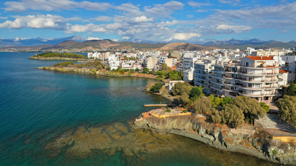 Fototapeta na wymiar Aerial photo of famous seaside town of Halkida with beautiful clouds and deep blue sky, Evia island, Greece