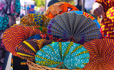 West African Fabric Fans at an Outdoor Market