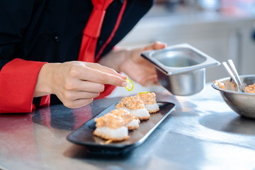 Chef plating finished appetizer