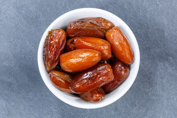 Dates fruit date from above bowl slate
