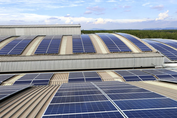 Solar PV Rooftop on Curve Roof under Beautiful Sky