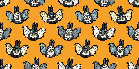 Seamless vector day of the dead comic style bat bunny pattern with hand drawn skeleton, masked bunny in black and orange. Funny and happy design for your perfect Halloween party.