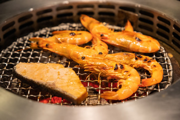 Grilled prawns on charcoal stove