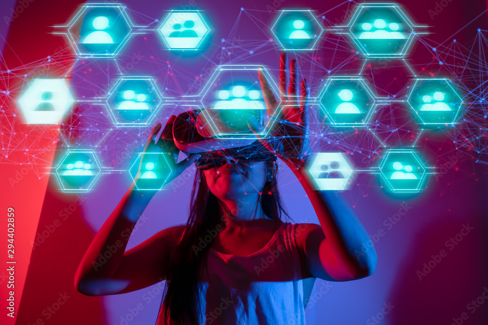 Poster global communication network and vr headset using futuristic interface concept.young woman using gla