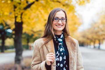 Beautiful woman in autumn