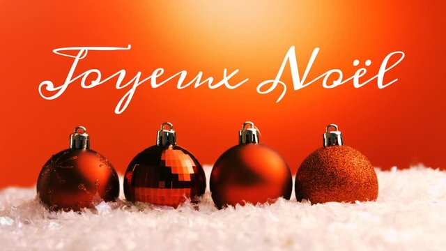 Joyeux No&Atilde;&laquo;l written over Christmas decorations
