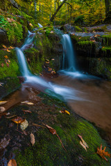 Dreamy autumn waterfall upstate New York in Catskill Mountains.