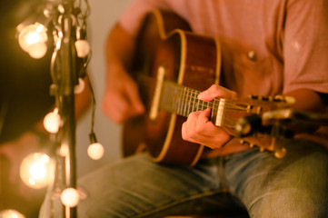 Close-up of musicians, guitarists playing blues at outdoor concerts, musical concept.