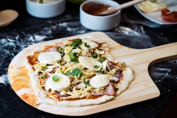 making homemade Italian-style pizza