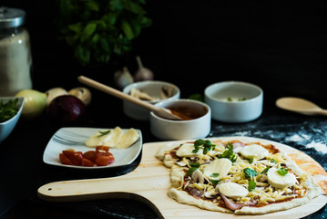 making homemade Italian-style pizza