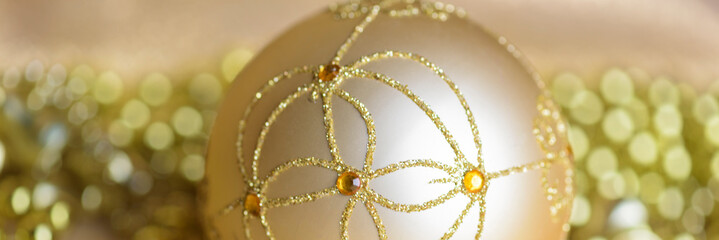 Golden Christmas toys on a golden background. 