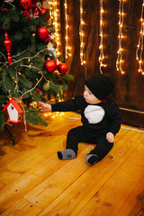 Happy fun child paying at home on Christmas time. Xmas holiday concept