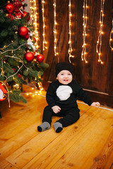 Happy fun child paying at home on Christmas time. Xmas holiday concept