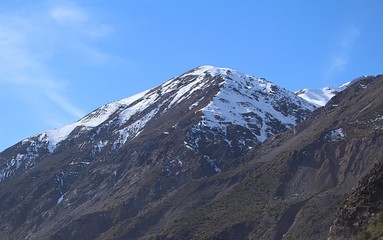 beautiful, big and high mountains with snowy on the top, in chilean andes mountain range.