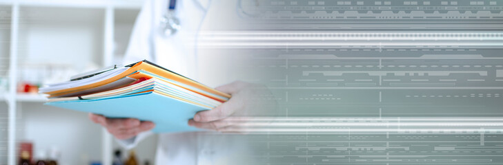 Doctor holding files; panoramic banner