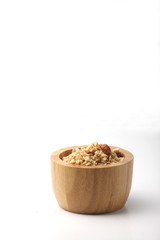 a bowl of muesli isolated on white background