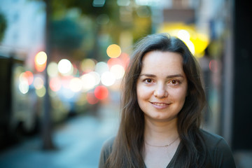 Obraz premium Closeup portrait of young woman outdoors