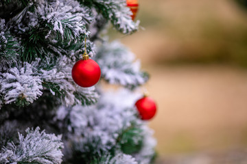 christmas ballsl and decorations with magic holiday lights
