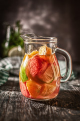 drink lemonade in glassware. drink with mint and lemon, and grapefruit with orange and lime
