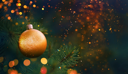Christmas and New Year holidays background. Glitter lights backdrop. Winter season. Text space. Closeup of Christmas-tree.