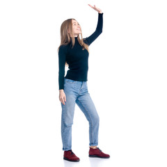 Woman in jeans and sweater waving smiling on white background isolation