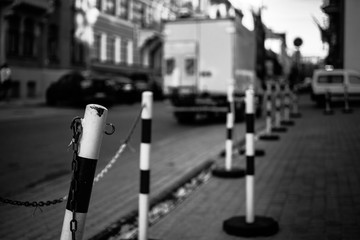 Isolarted shot of a street pole with a chain