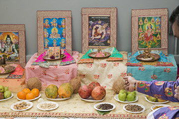 Hinduism ceremony with food and Gods