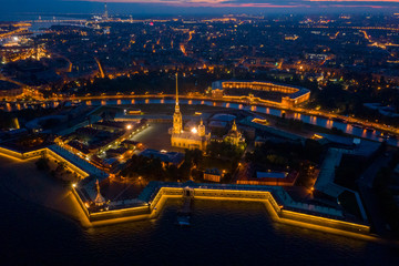 Aerial night view of Peter and Paul Fortress with cityscape, Saint-Petersburg, Russia