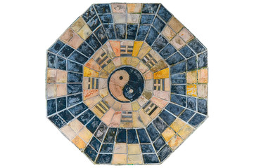 Yin-Yang and fengshui symbol made with stone tiles