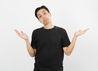 Young handsome asian man making doubts gesture isolated on white background.