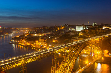Fototapeta na wymiar Porto old town and the Dom Luis Bridge at night, Portugal