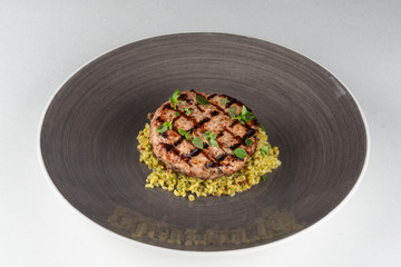 Turkey chop with quinoa isolated on white flat lay