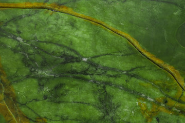 Green natural marble with brown veins in cracks, texture for ceramic tiles and floor tiles