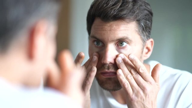 Portrait of a man in front of mirror 