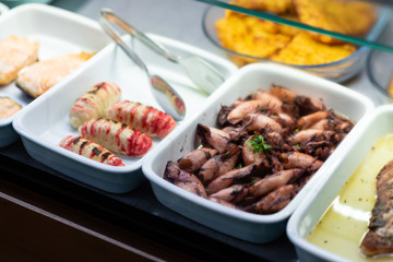 Prepared fish and seafood in shelf of restaurant 