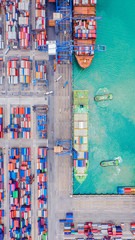 Top view of Deep water port with cargo ship and containers. It is an import and export cargo port...
