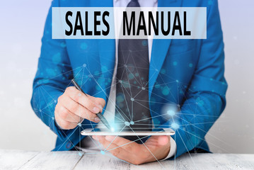 Text sign showing Sales Manual. Business photo showcasing set of printed materials containing...