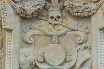 A skull sculpture, part of Statue of St Francis Borgia  on Charles Bridge, Prague, Czech.