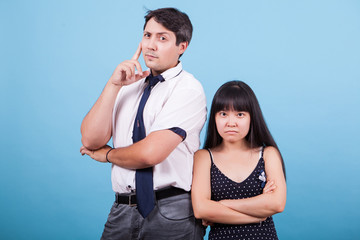 Naklejka premium Portrait of serious interracial couple looking at the camera