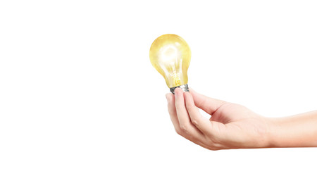 Hand of holding illuminated light bulb, innovation inspiration concept