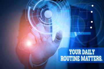 Text sign showing Your Daily Routine Matters. Business photo text Have good habits to live a healthy life Male human wear formal work suit presenting presentation using smart device
