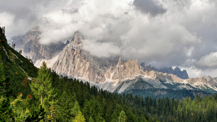 Mountain peaks in clouds. Dolomites in Italy