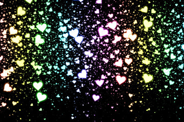 Gradient hearts on black background. Valentine's Day abstract background with hearts