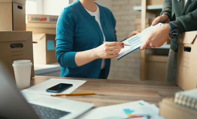 people are working  at warehouse