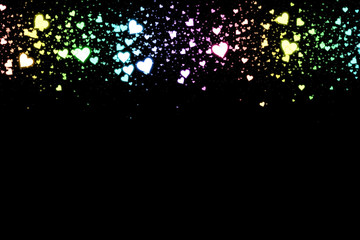 Gradient hearts on black background. Valentine's Day abstract background with hearts