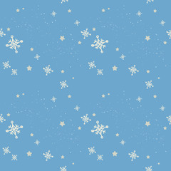 white snowflakes on the blue background seamless pattern