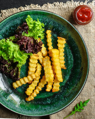 french fries and sauce (delicious snack, fast food, deep fried potatoes) menu concept. food background. copy space. Top view